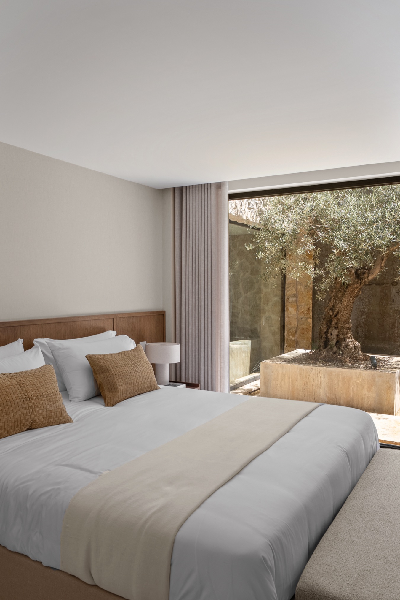 Villa Siena bedroom overlooking the olive courtyard